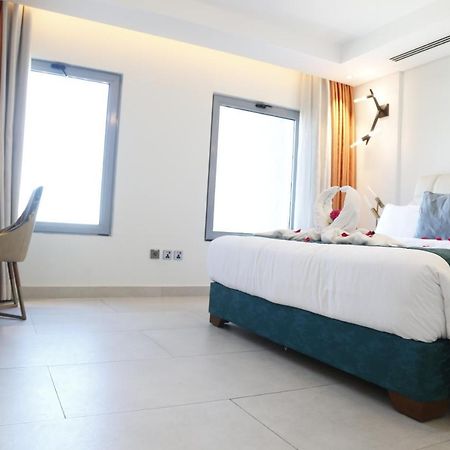 Waterfront Hotel Apartment Lusail Εξωτερικό φωτογραφία A room at the hotel