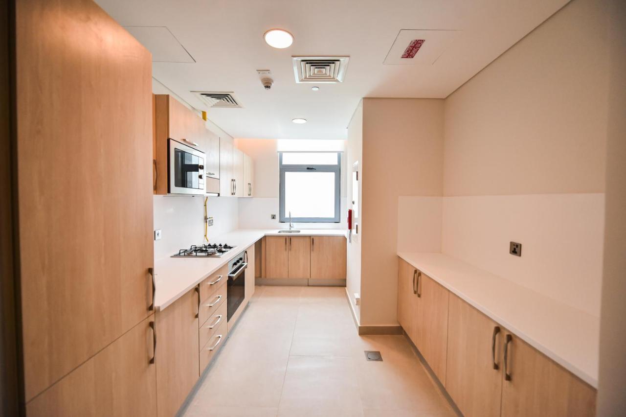 Waterfront Hotel Apartment Lusail Εξωτερικό φωτογραφία A typical kitchen in a student flat