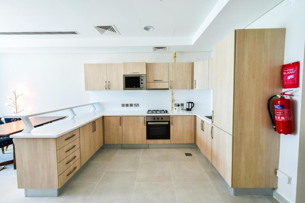 Waterfront Hotel Apartment Lusail Εξωτερικό φωτογραφία A typical kitchen in a student residence hall