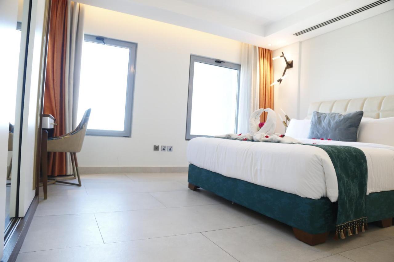 Waterfront Hotel Apartment Lusail Εξωτερικό φωτογραφία A room at the hotel