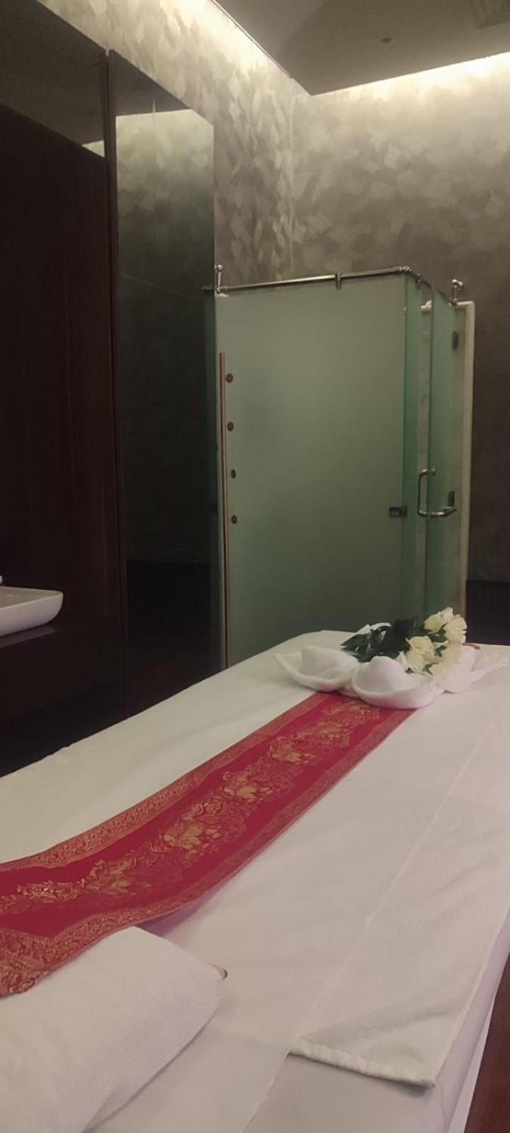 Waterfront Hotel Apartment Lusail Εξωτερικό φωτογραφία A shower cubicle in a Thai spa